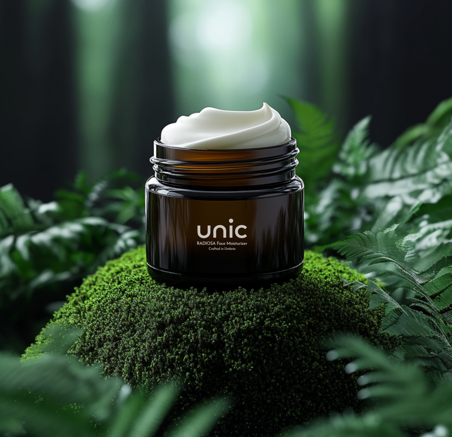 UNIC Radiosa Organic Face Cream in a glass jar with gold lid, styled with green leaves and natural elements